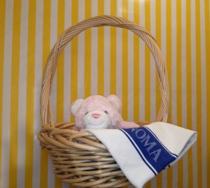 Baby Snuffles in Basket with Tea Towel